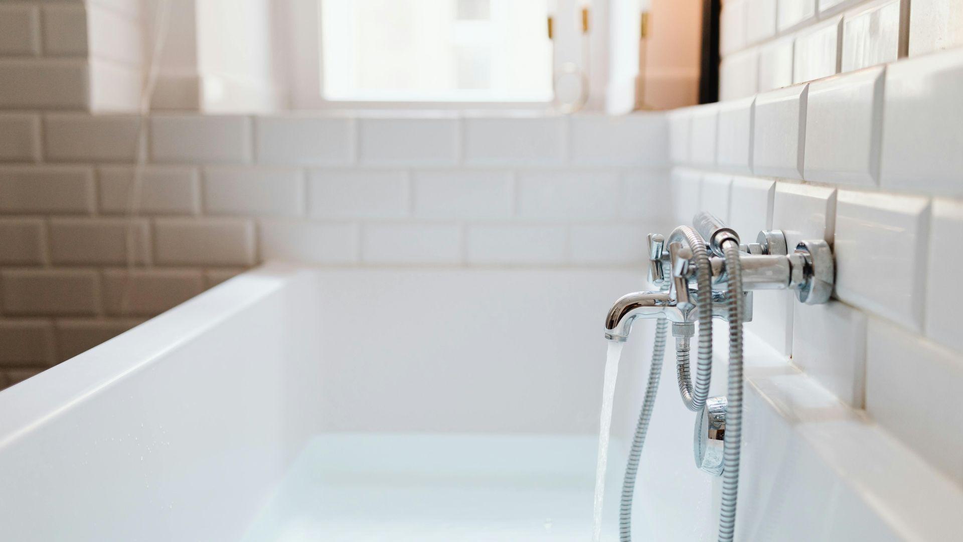 Faucet filling up a bathtub